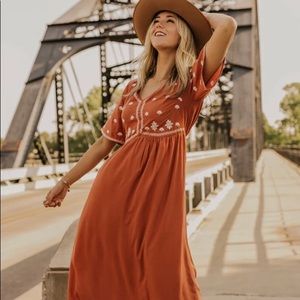 Roolee rust colored embroidered maxi dress. Never worn. Size medium.